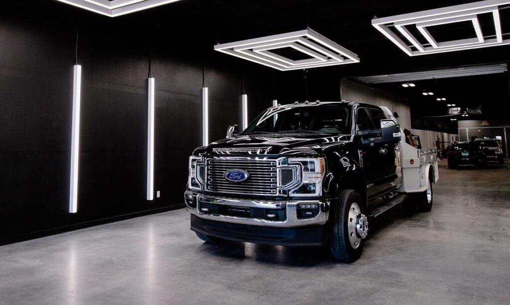 Heavy-duty Ford truck after collision repair in Landers showroom
