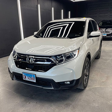 White Honda SUV after collision repair