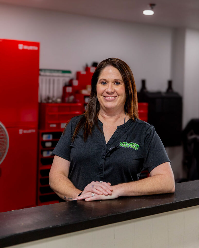 Portrait of a Lander's employee posing with company shirt on