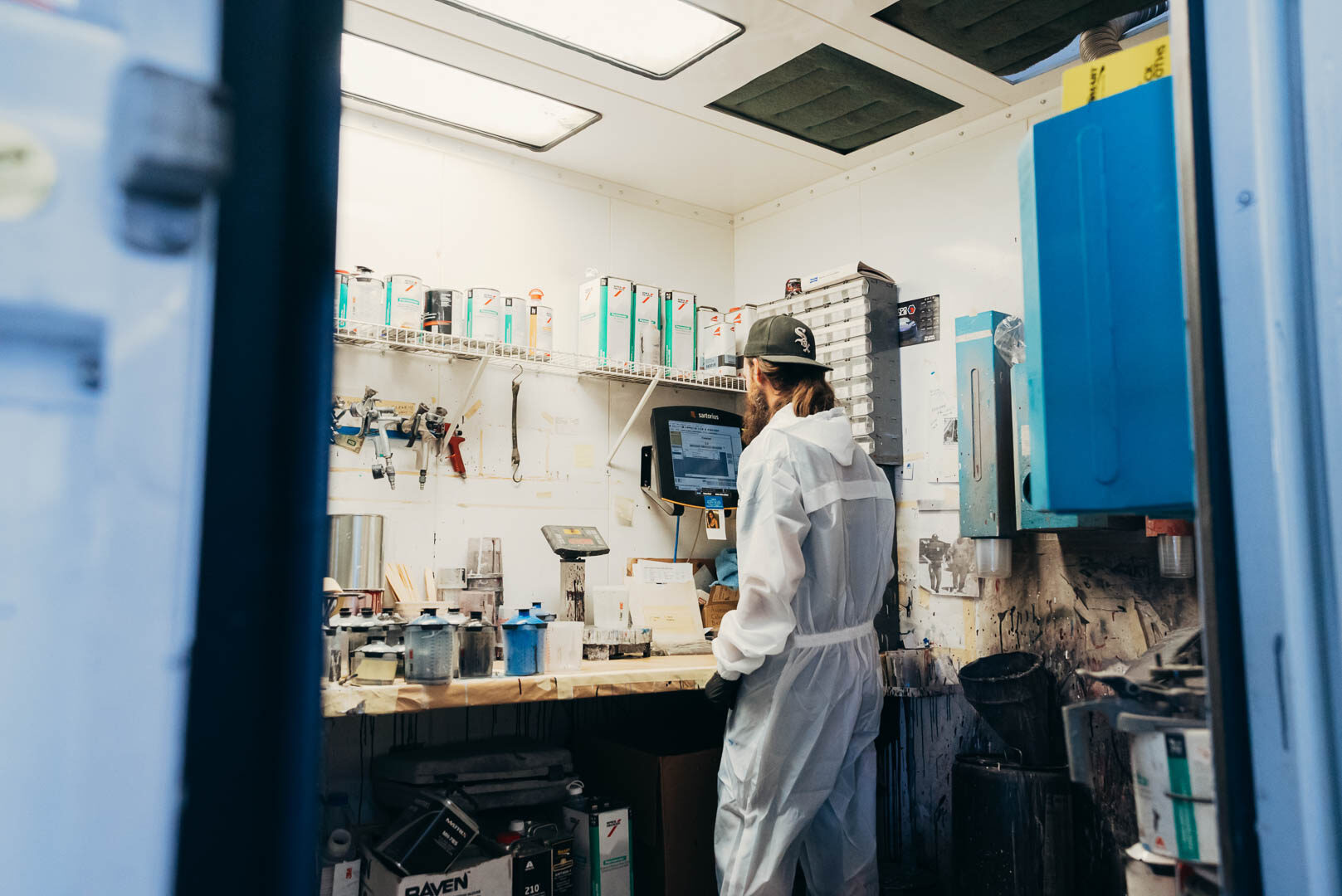 Lander's automotive painter dialing in paints in computer