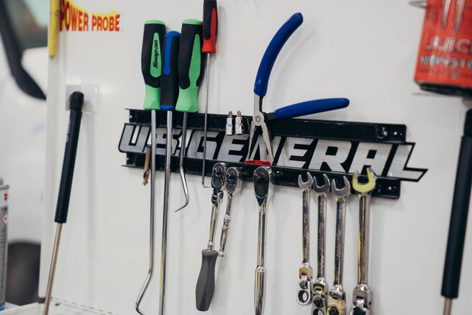 Close-up of US General sign with tools hanging on the wall