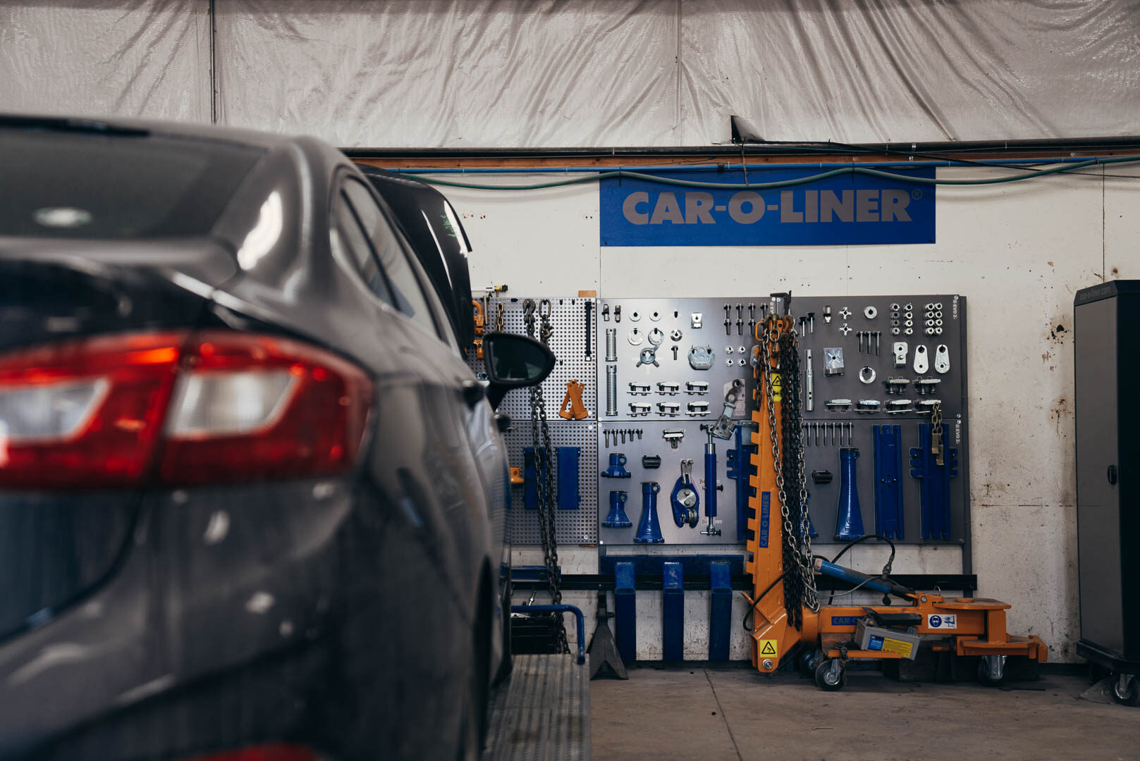 Wall of blue and silver automotive tools