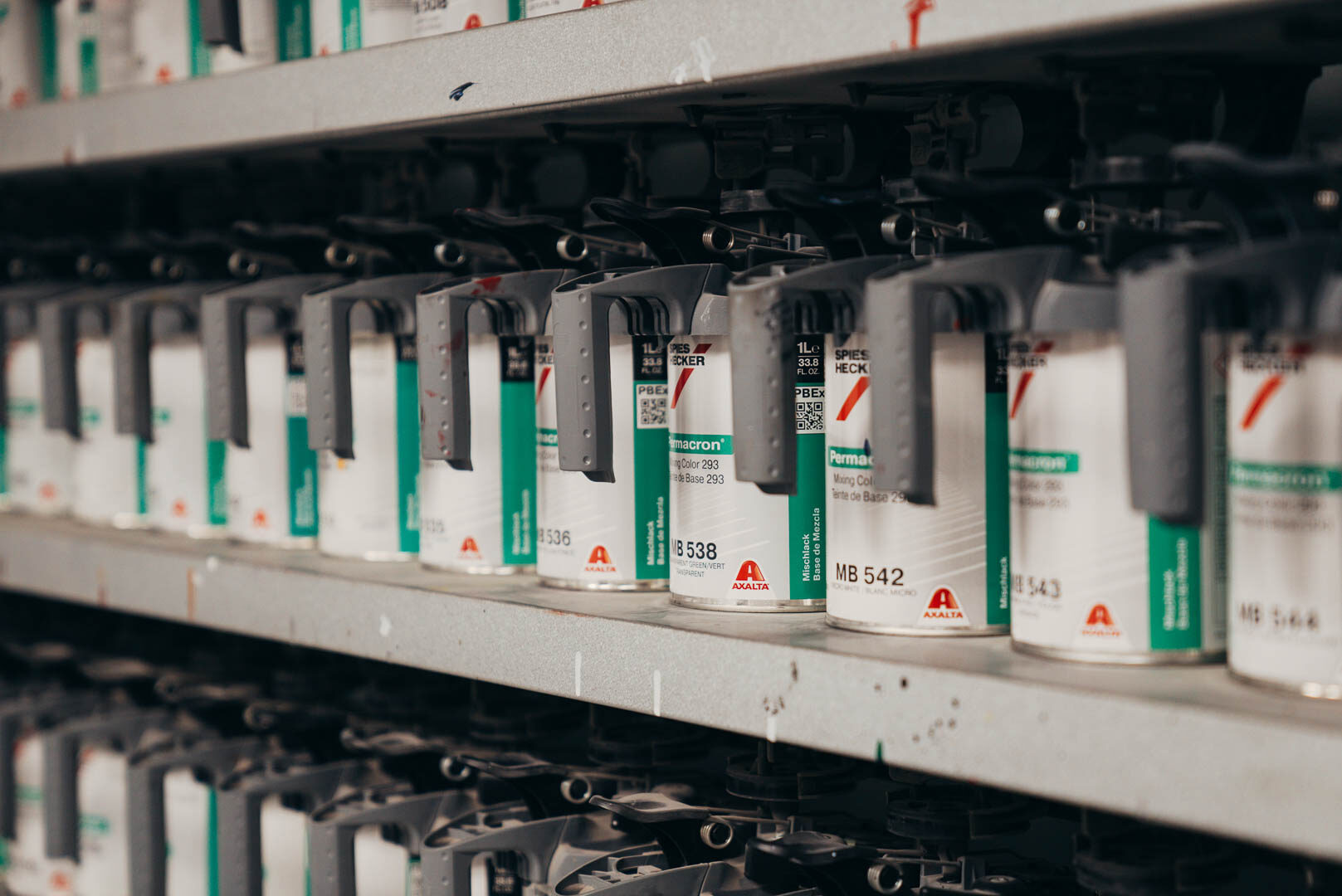 Close-up of a row of different automotive paints