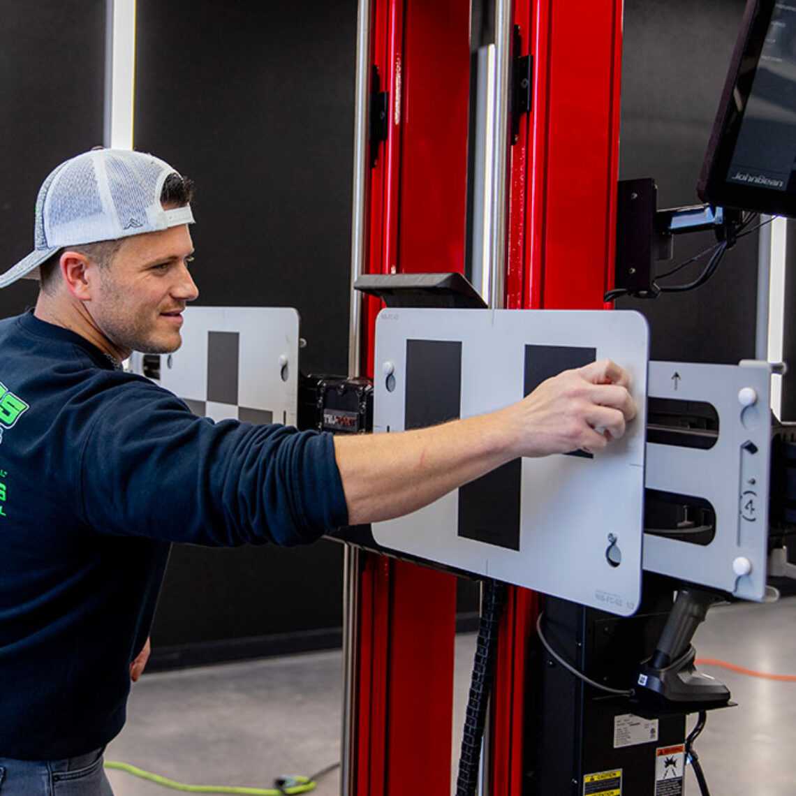 Landers technician setting up ADAS device