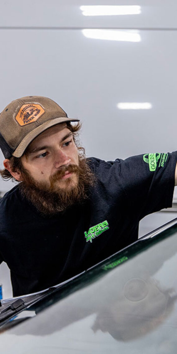 Landers auto mechanic washing window