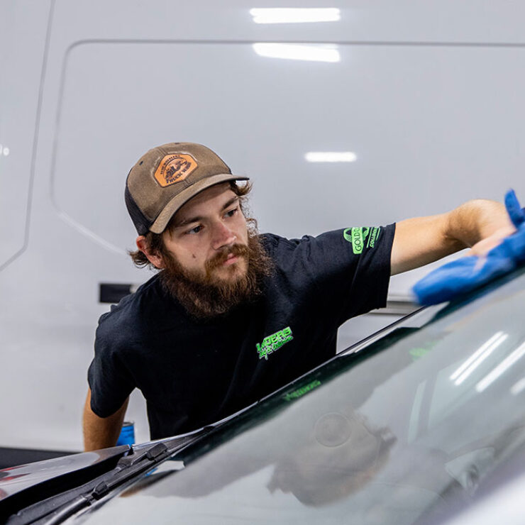 Landers auto mechanic washing window