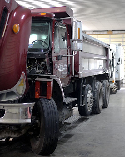 Landers heavy-duty truck being serviced in garage