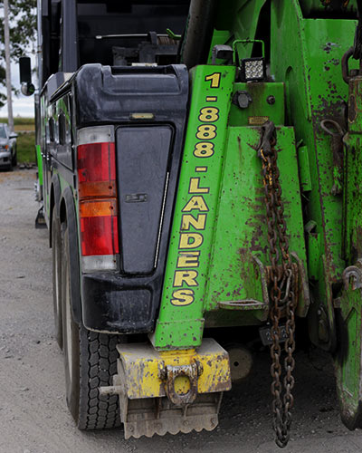 Fender of Landers truck with phone number